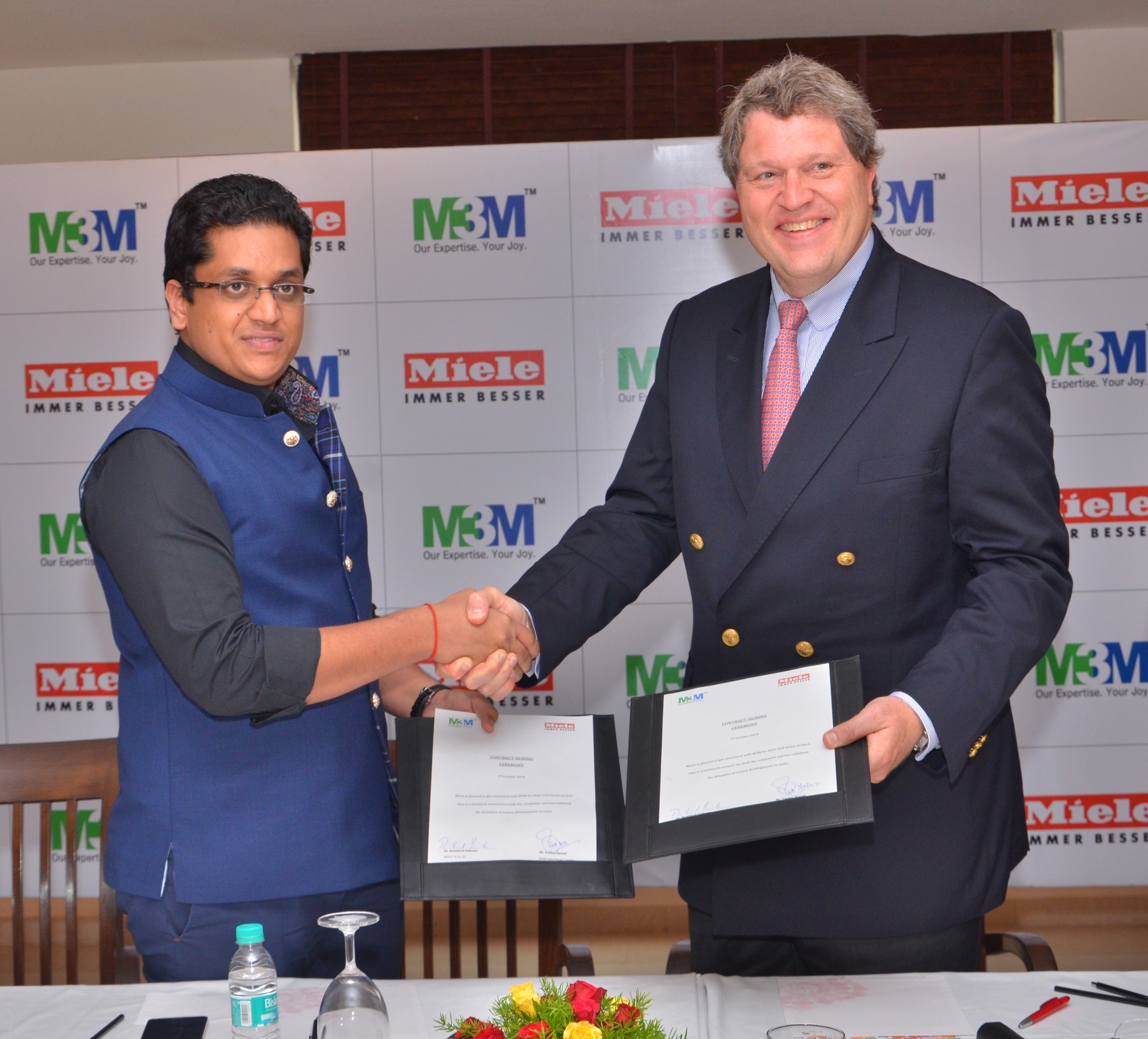Pankaj Bansal, Director-M3M India with Dr. Reinhard Christian Zinkann, the proud co-owner and managing director of Miele Group, Germany, India real estate news, Indian realty news, India property market, Luxury real estate, Gurgaon real estate